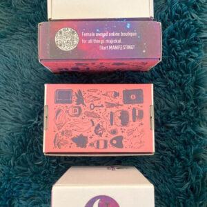 Stack of vibrant custom printed shipping boxes with illustrated artwork and messaging